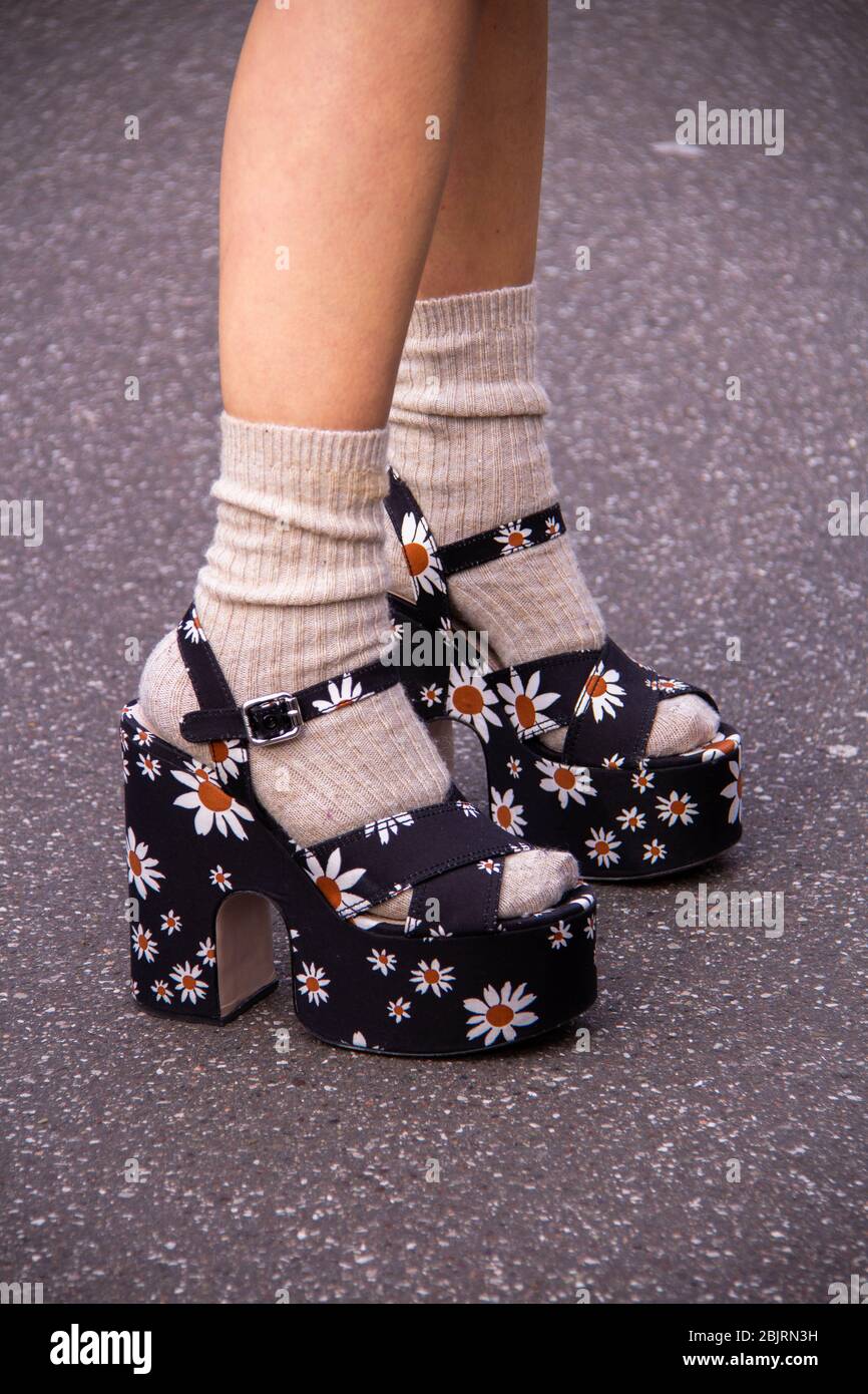 PARIS, FRANCE - March 03 : A guest wearing Miu Miu black shoes with flowers  outside Miu Miu, during Paris Fashion Week Womenswear Fall/Winter 20/21  Stock Photo - Alamy