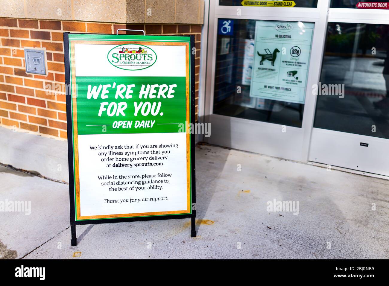 Herndon, USA - April 27, 2020: Sprouts Farmers Market sign for grocery store entrance for social distancing delivery during coronavirus Covid-19 epide Stock Photo