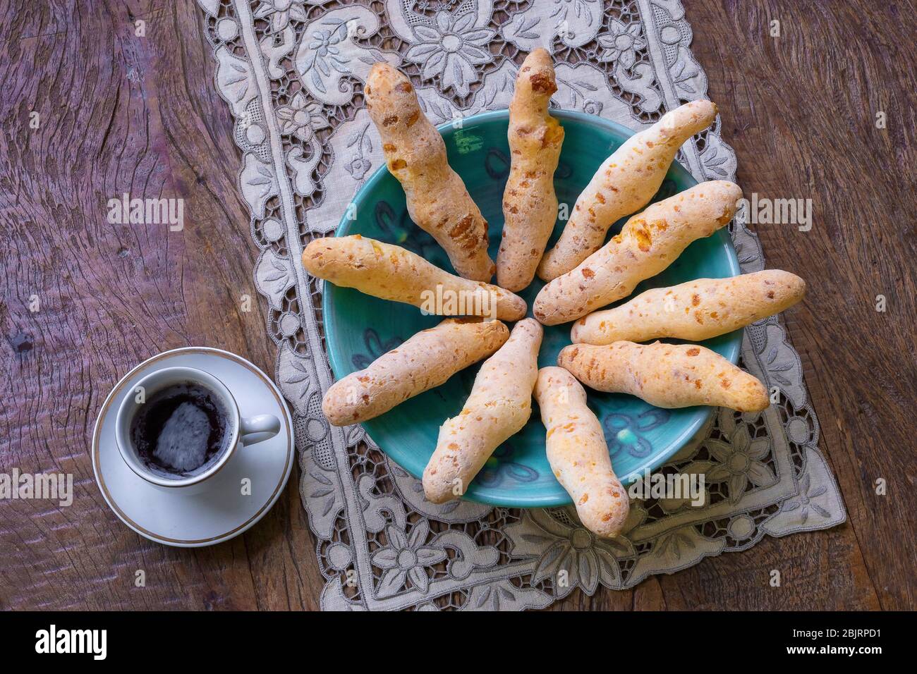 cheese bread in the form of chopsticks in a mug. Stock Photo