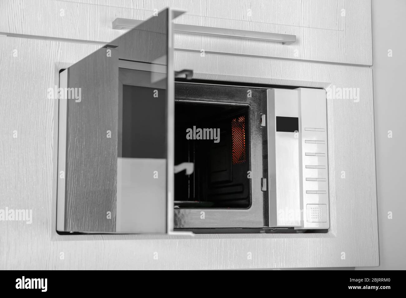 New white microwave oven in kitchen, closeup Stock Photo Alamy