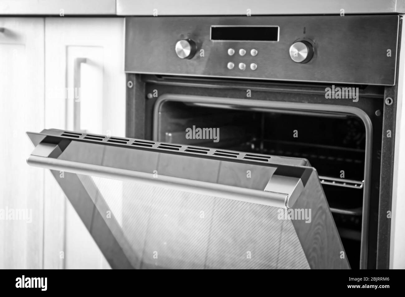 New electric oven in kitchen Stock Photo Alamy