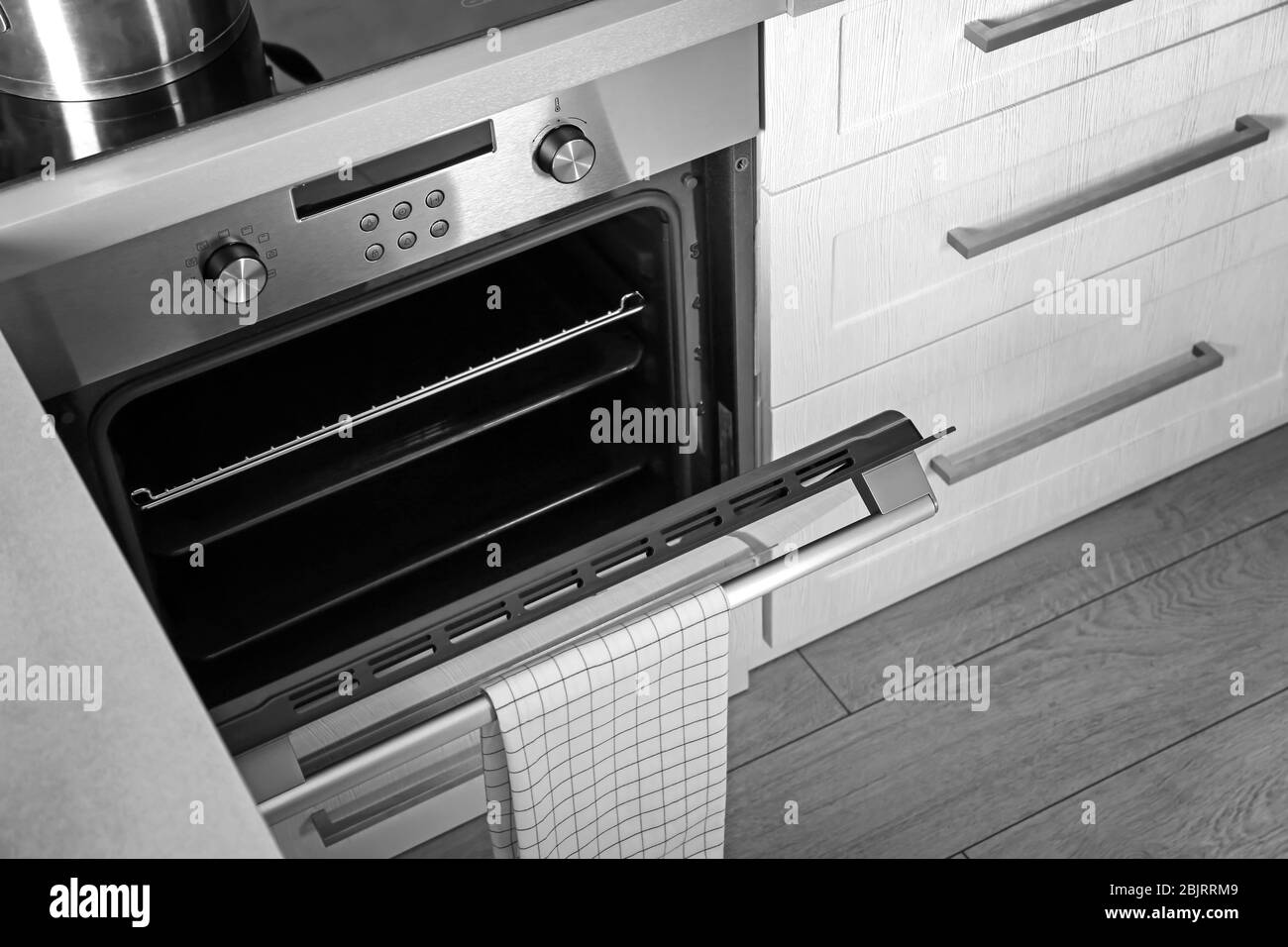 New electric oven in kitchen Stock Photo Alamy
