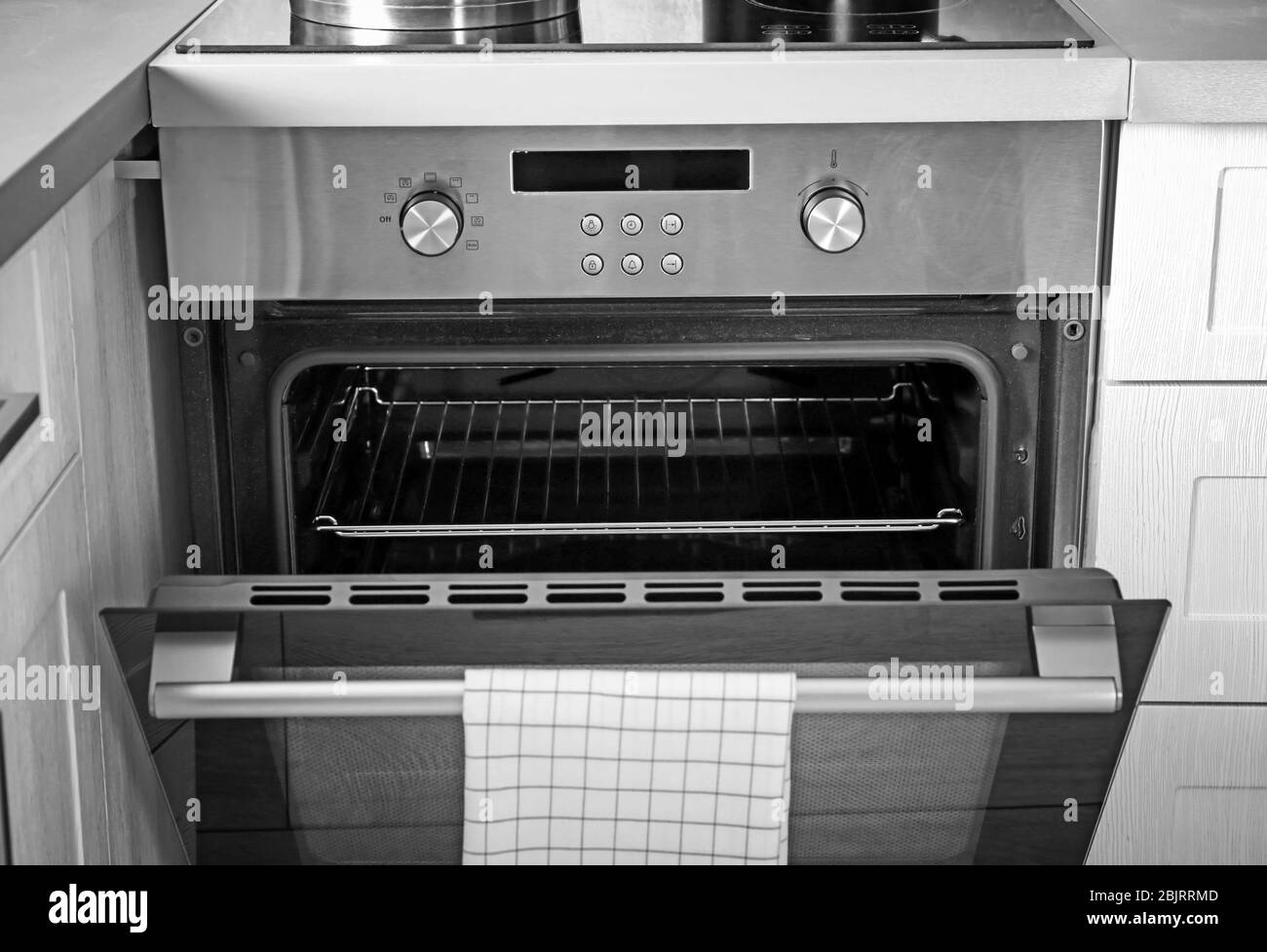 New electric oven in kitchen Stock Photo Alamy