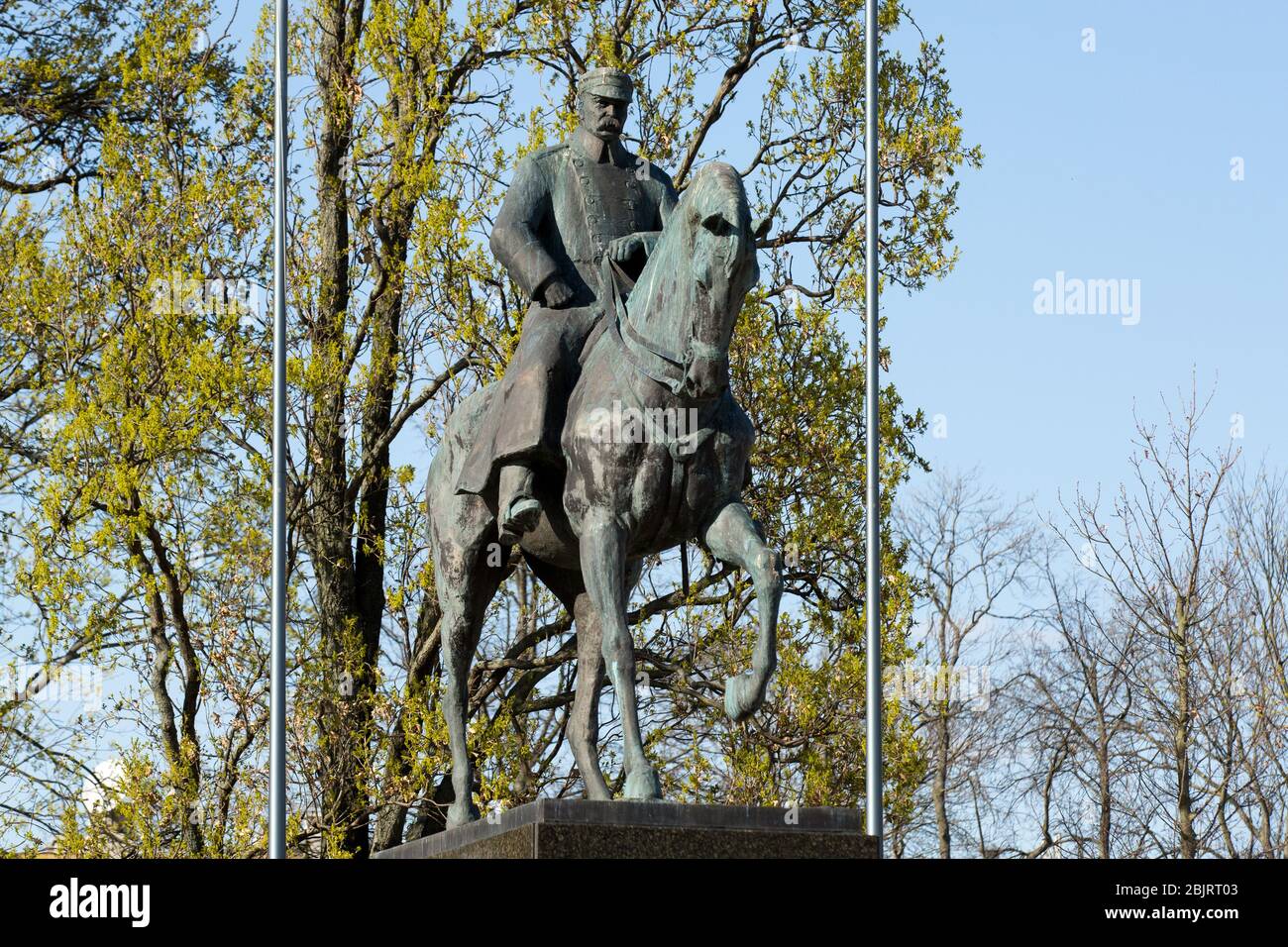View of the Jozef Pilsudski Monument at the Plac Litewski (Litewski Square) during the Coronavirus (COVID-19) lockdown crisis.Due to coronavirus restrictions on movement, bars and restaurants are closed and the streets of Polish cities are depopulated. Stock Photo