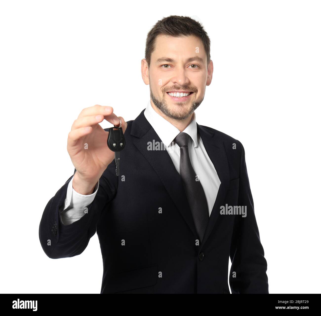 Smiling salesman holding car hi-res stock photography and images - Alamy