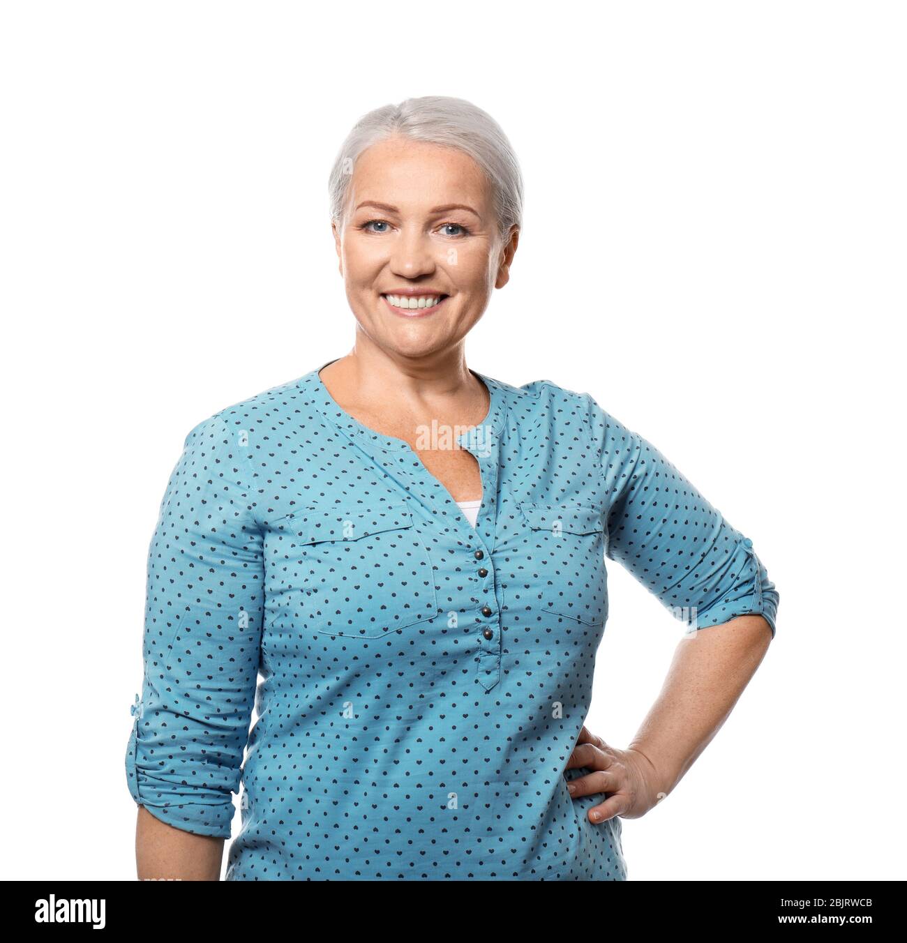 Portrait of smiling mature woman on white background Stock Photo - Alamy