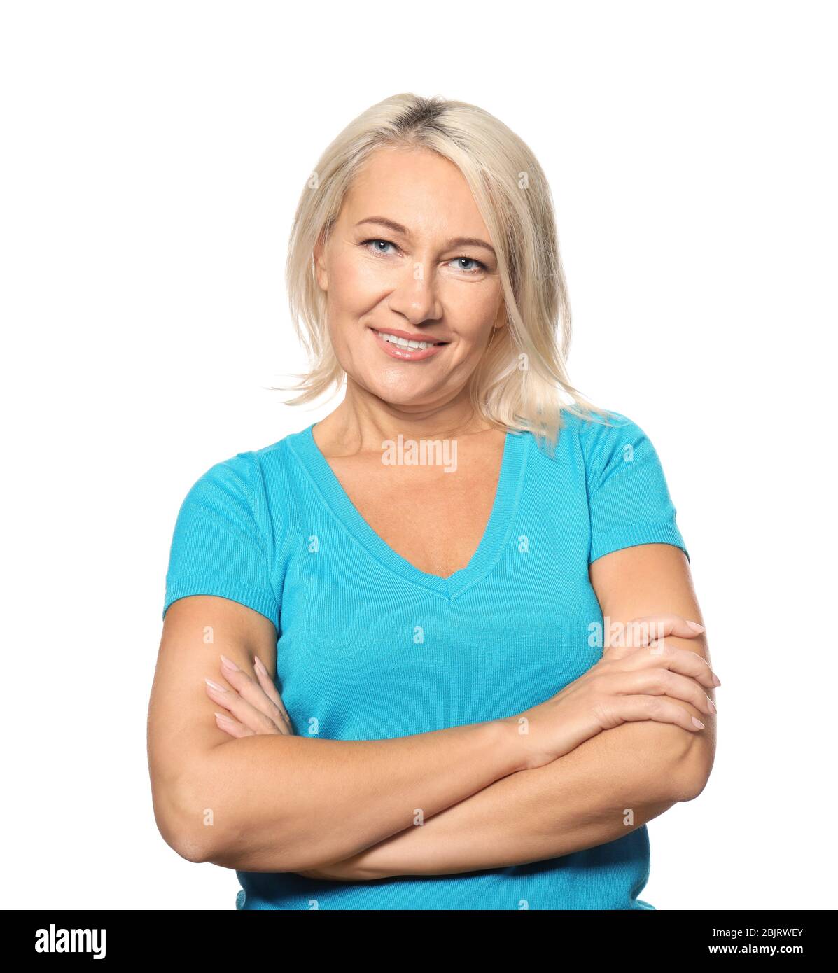 Portrait of smiling mature woman on white background Stock Photo - Alamy