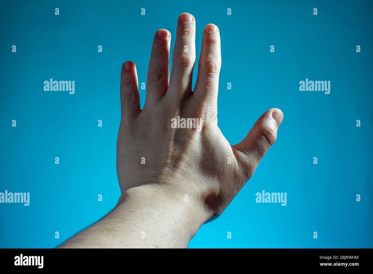Male hand showing stop close up hi-res stock photography and images - Alamy
