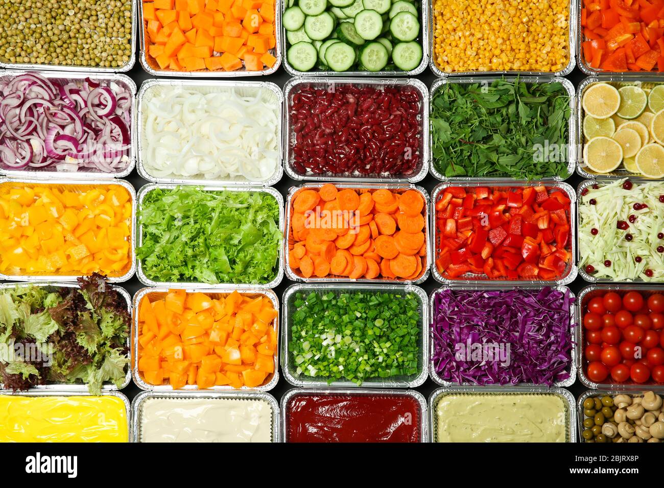 Top view of salad bar with assortment of ingredients Stock Photo Alamy