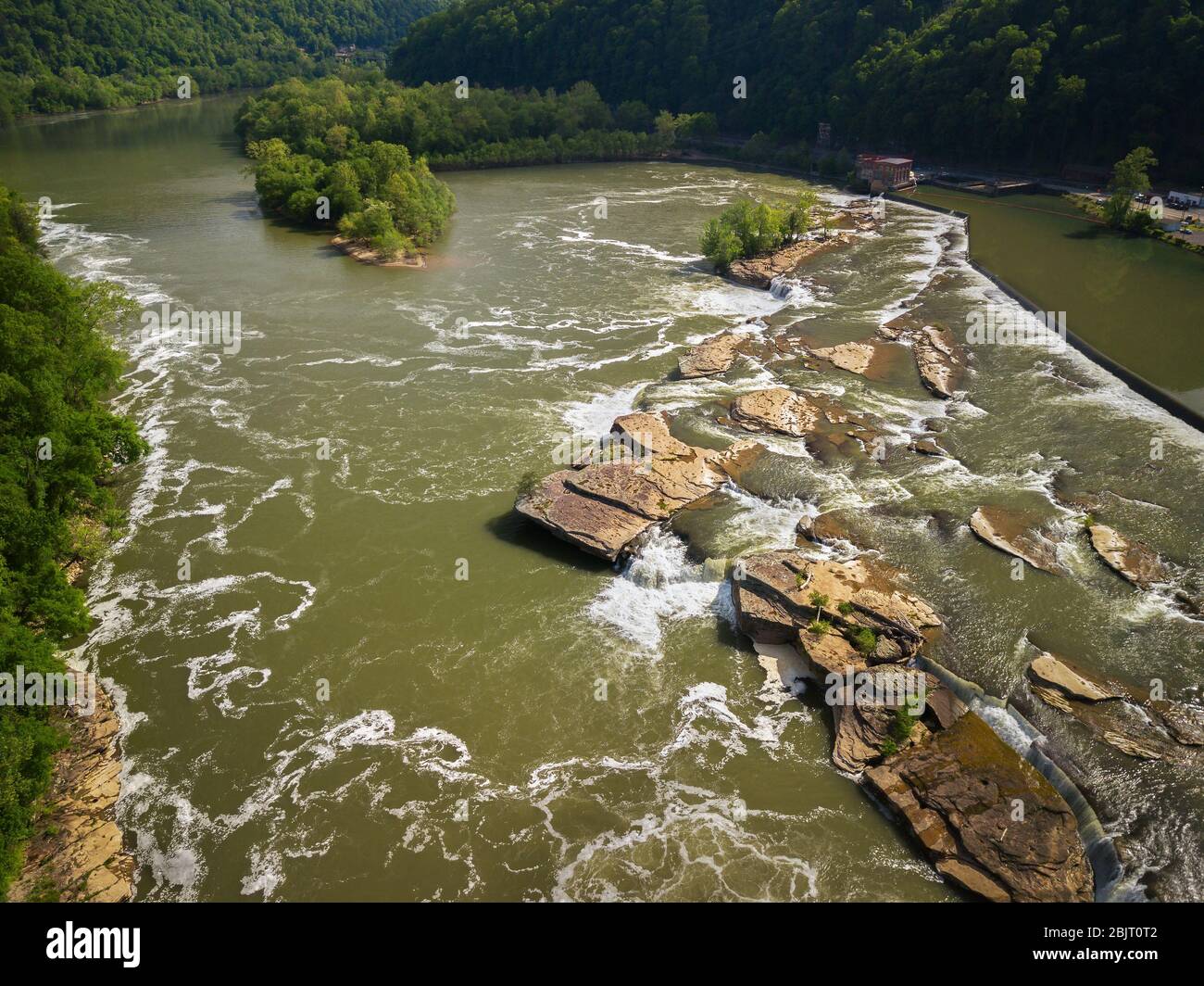 Aerial view of the Kanawha Falls stretch where the New River becomes the Kanawha River from the side opposite of the hydroelectric dam. Stock Photo