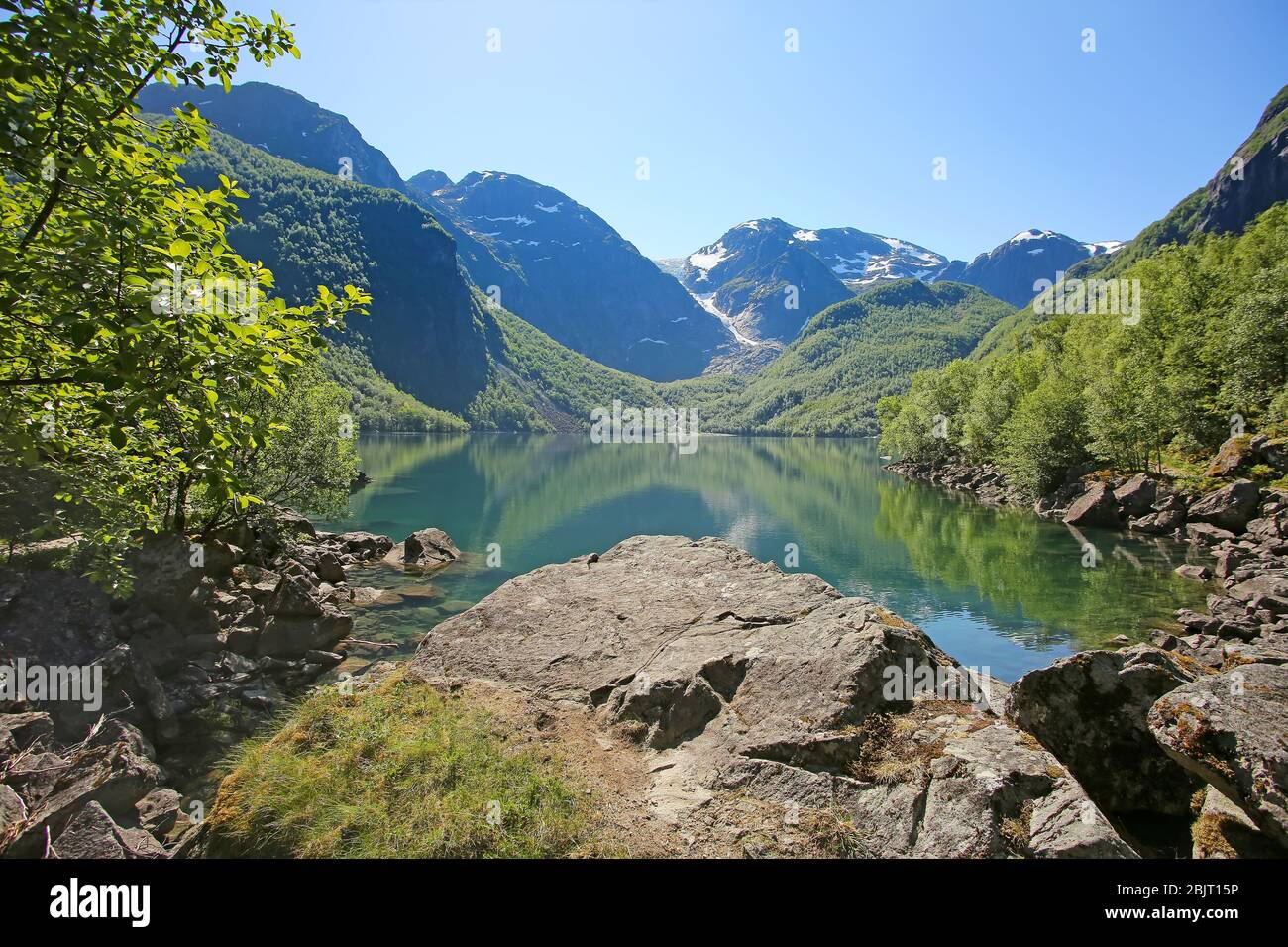 Bondhus Lake with beautiful scenery & reflections in the water. Reached along the mountain hike, near Rosendal, Folgefonna National Park, Norway. Stock Photo