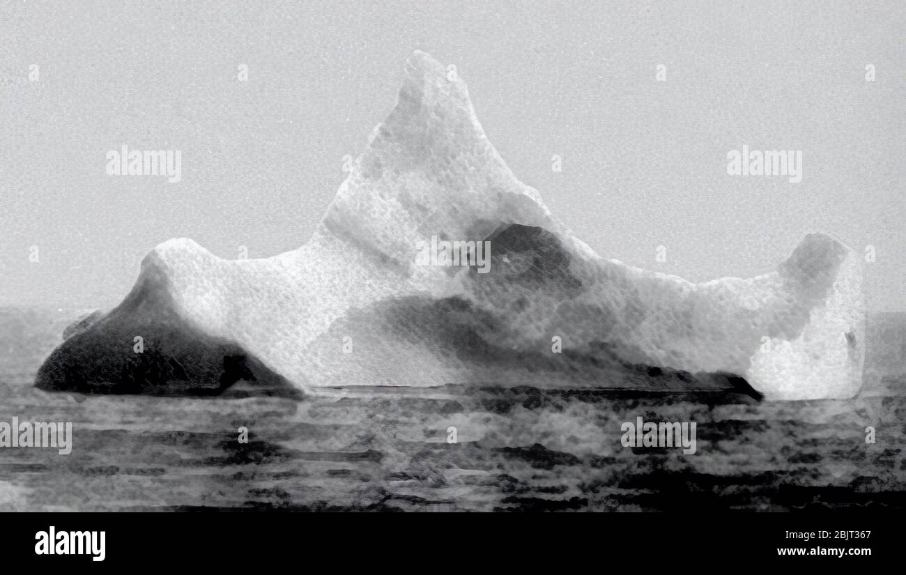 The iceberg believed of having sunk the RMS Titanic. This iceberg was photographed by the principal steward of the liner Prinz Adalbert on the morning of April 15, 1912, simply a couple of miles southern of where the Titanic sank Stock Photo