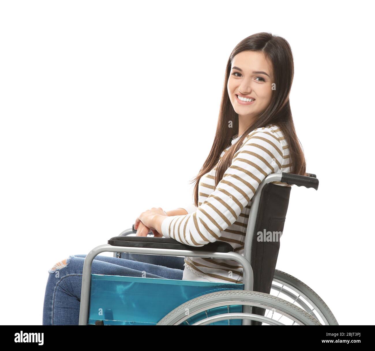 Young woman in wheelchair on white background Stock Photo - Alamy