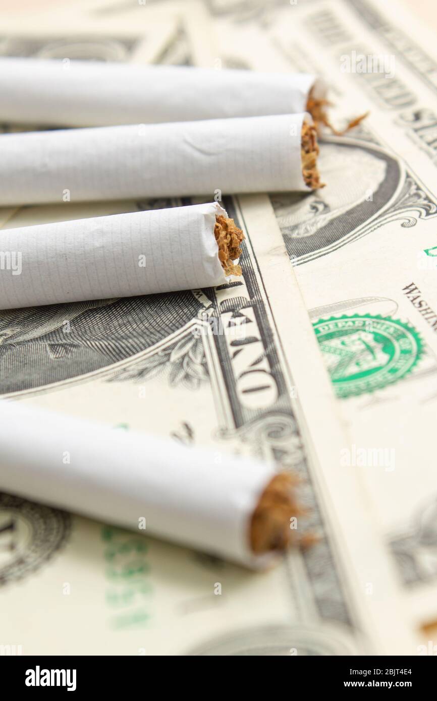 one dollar bill tobacco cigarettes Stock Photo Alamy