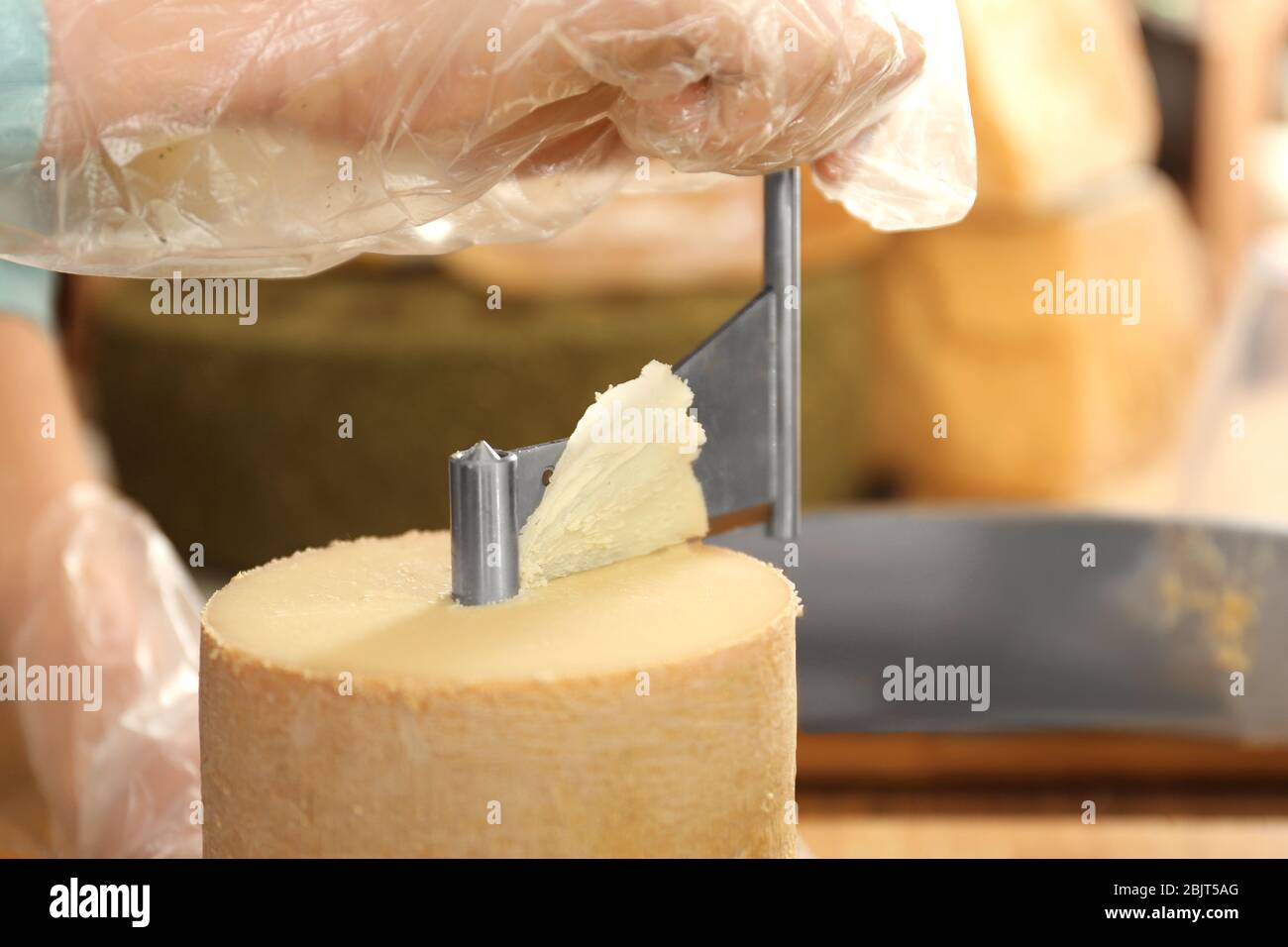 Cheese and Girolle cheese shaver Stock Photo - Alamy