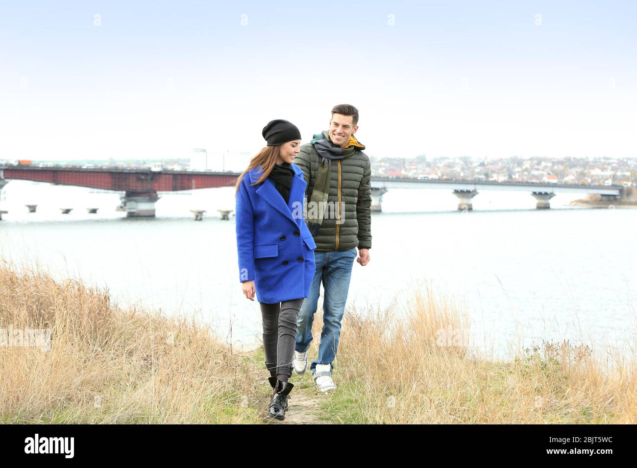 Young couple near riverside hi-res stock photography and images - Alamy