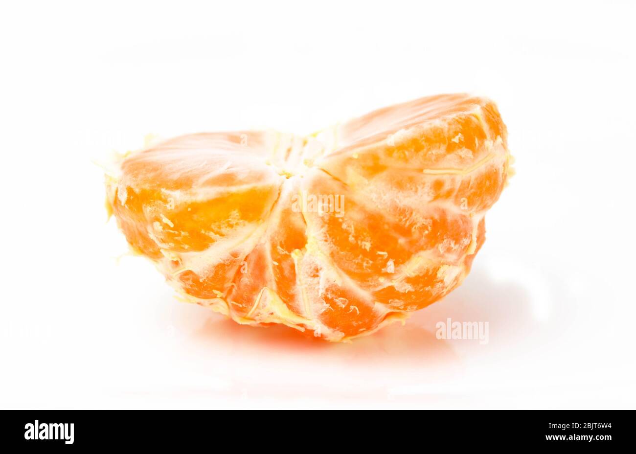 Half tangerine orange cut in half on a white background Stock Photo Alamy