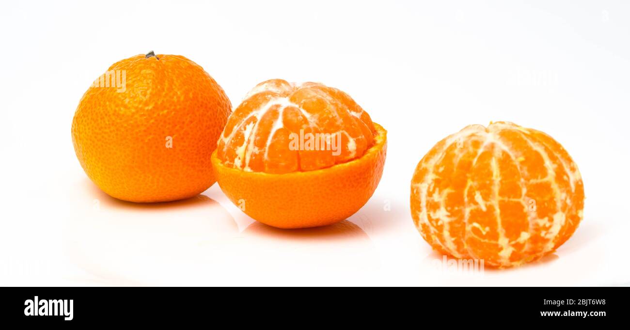 Half tangerine orange cut in half on a white background Stock Photo Alamy