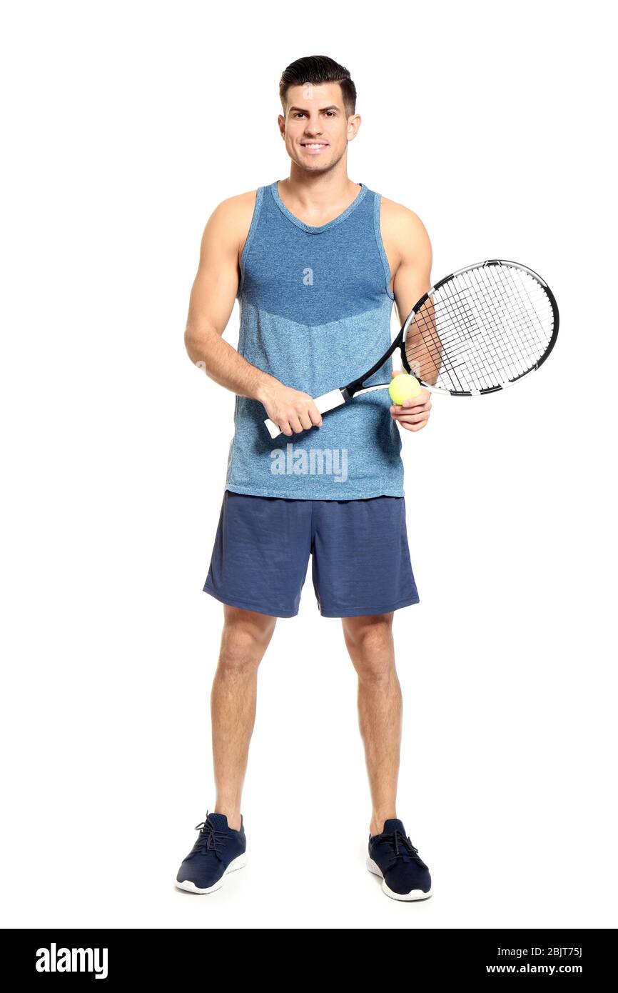 Man Using Tennis Racket Portrait of handsome man with tennis racket and ball against white ...