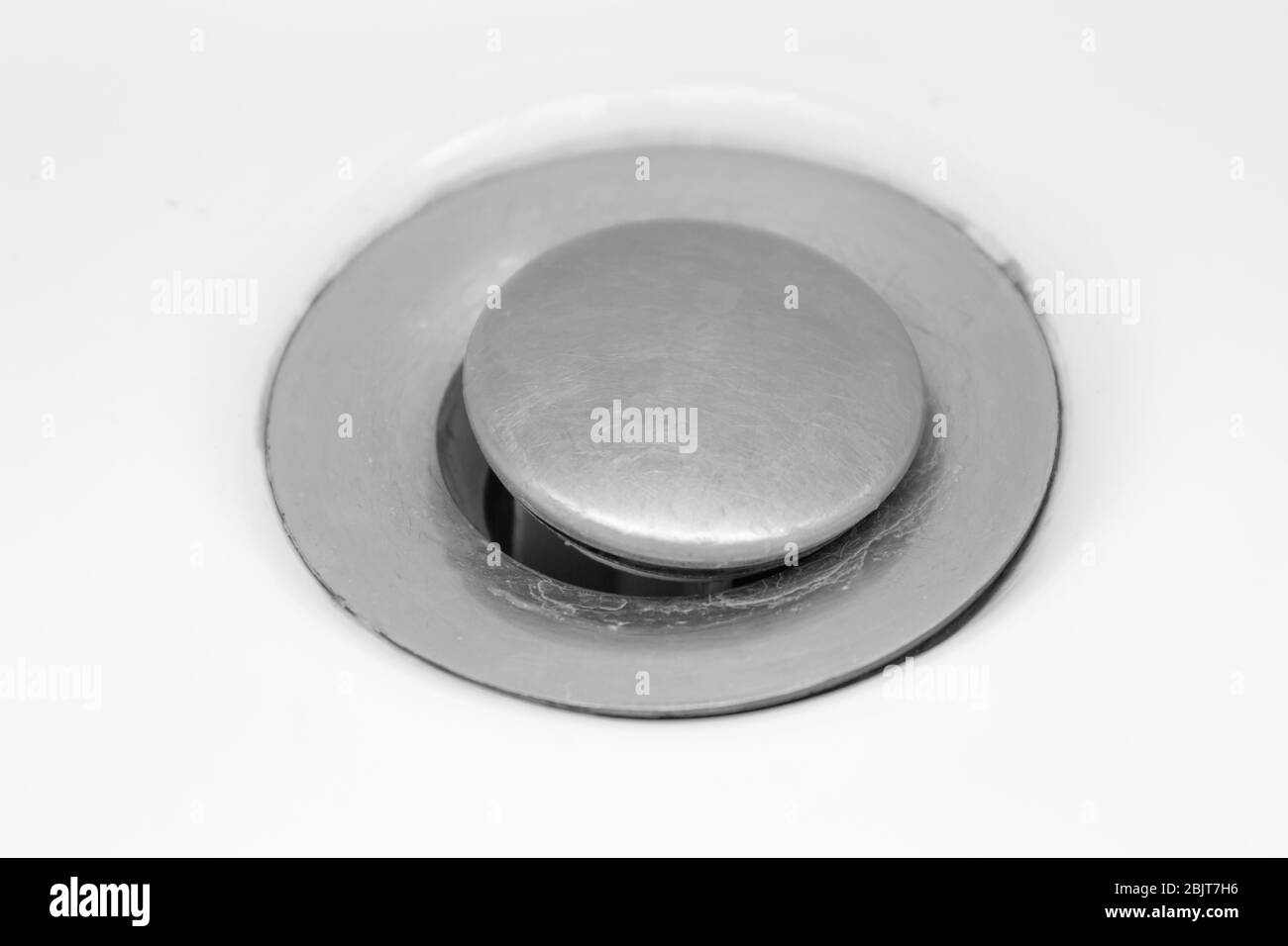 Drain for water in the sink, bathtub on a white background Stock Photo