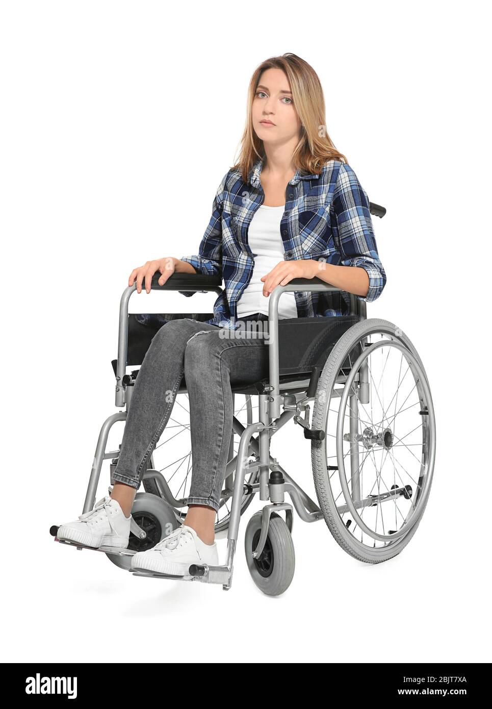 Young woman in wheelchair on white background Stock Photo - Alamy