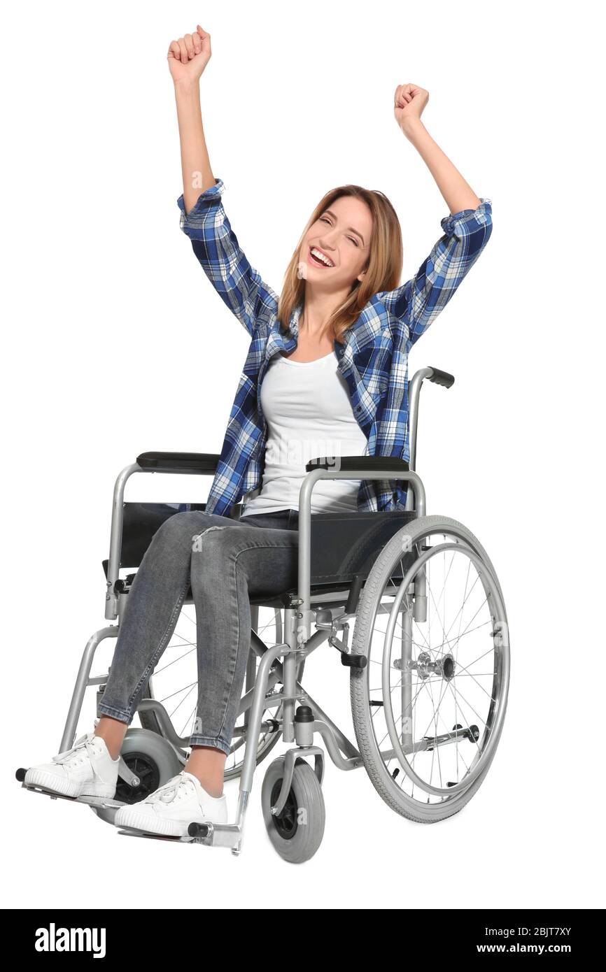 Young woman in wheelchair on white background Stock Photo - Alamy