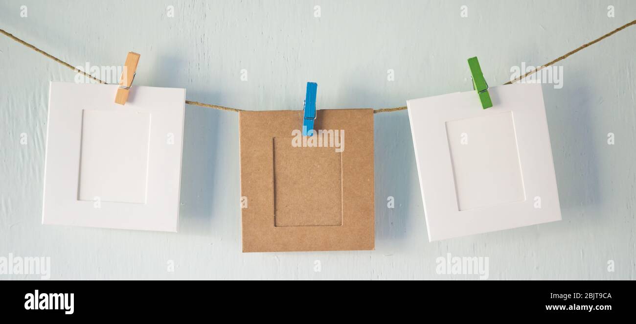 Two photo frames on a rope Stock Photo