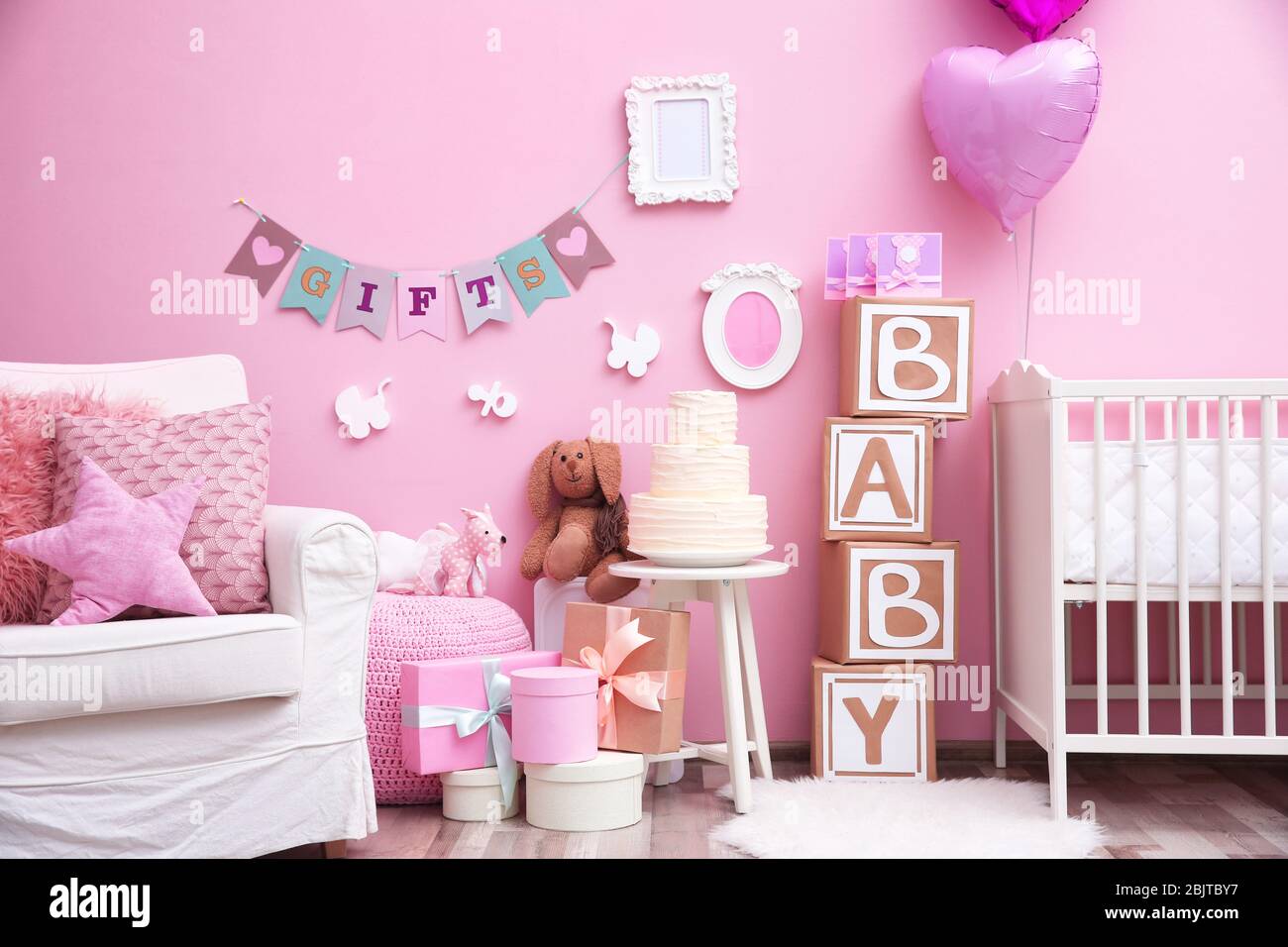Beautiful decorations for baby shower party in room Stock Photo - Alamy