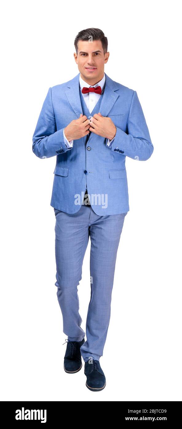 Handsome man in elegant suit on white background Stock Photo - Alamy
