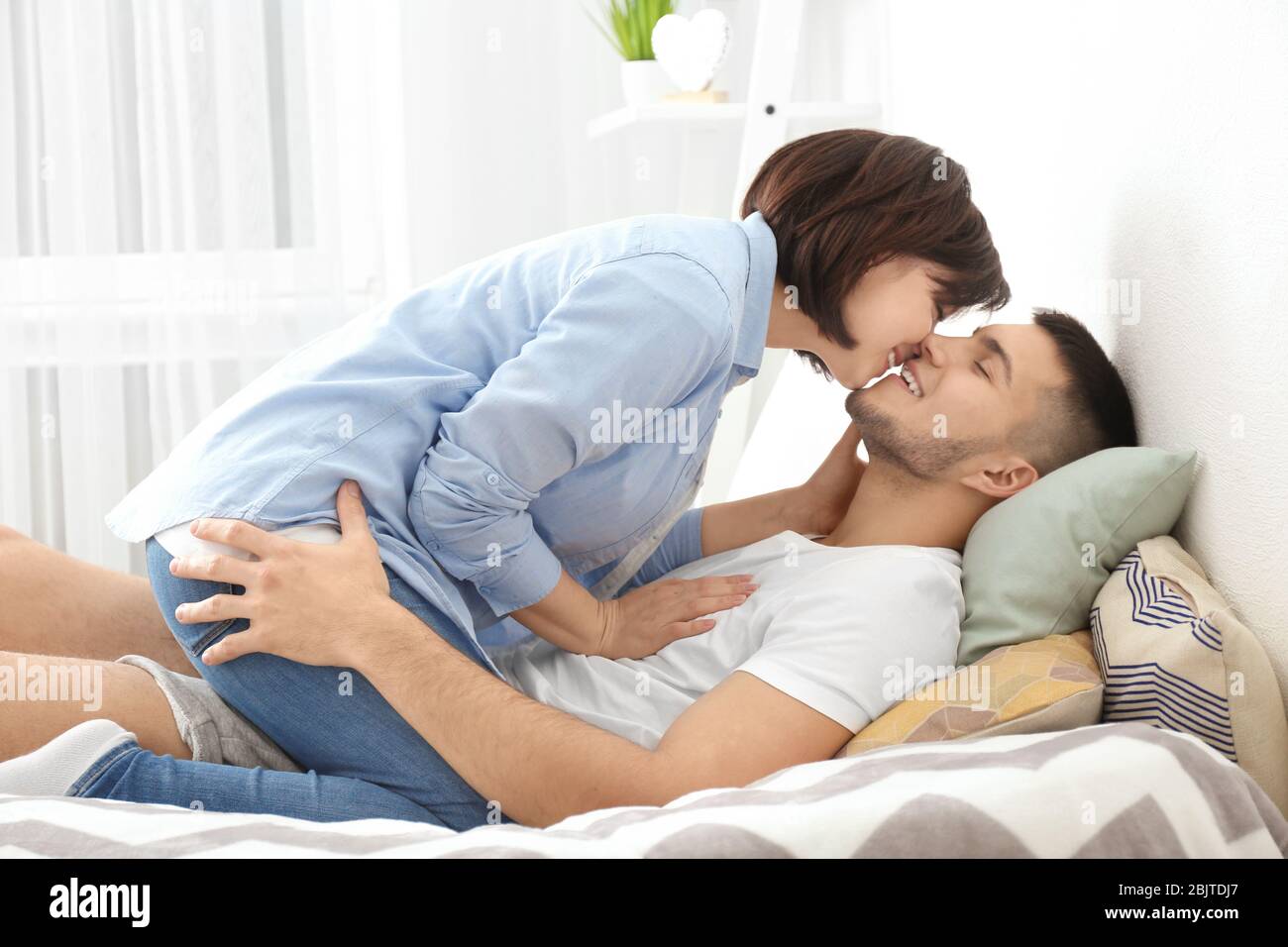 Couple about to kiss bedroom hi-res stock photography and images - Page 13  - Alamy