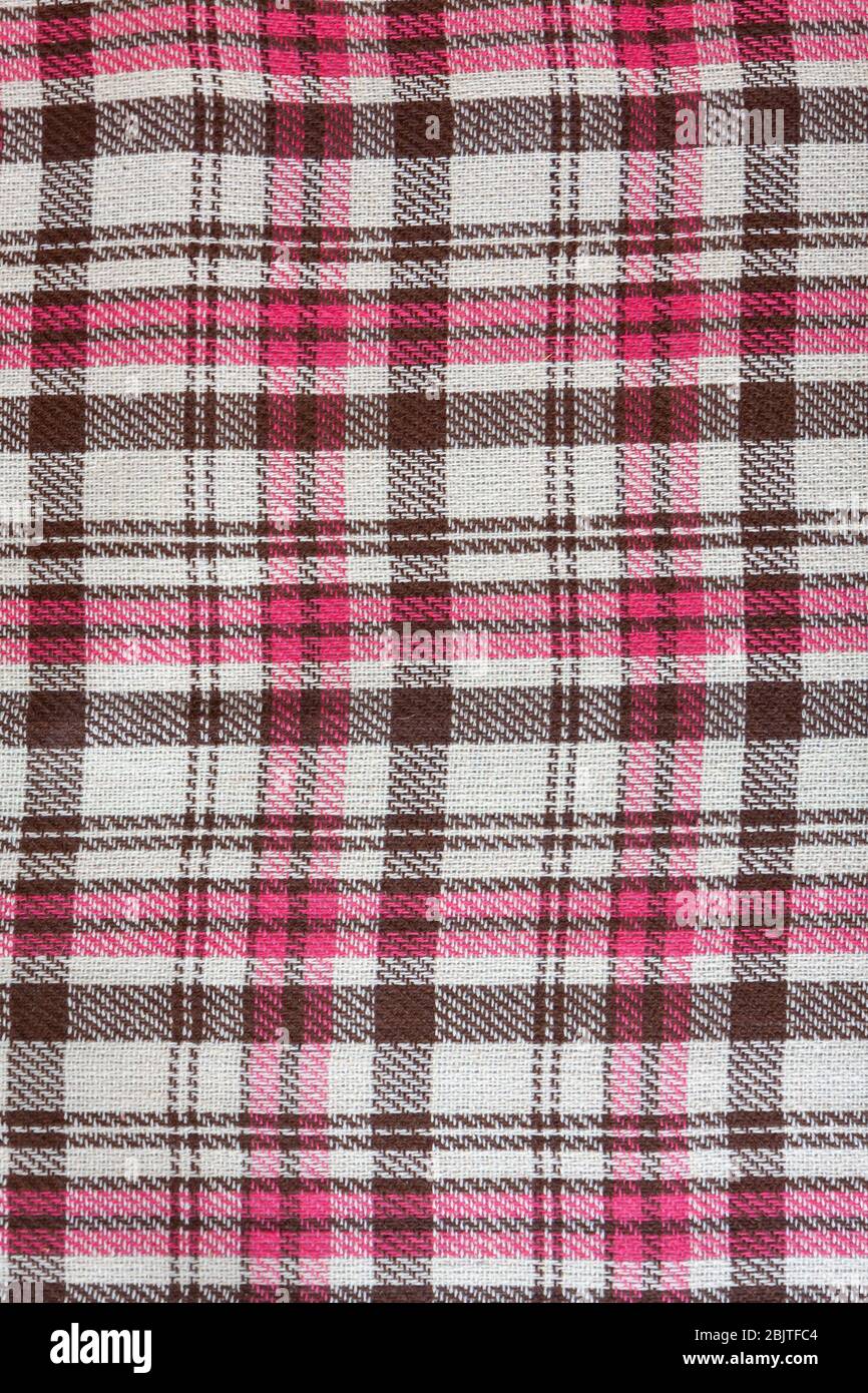 realistic brown pink checkered woolen plaid, background Stock Photo