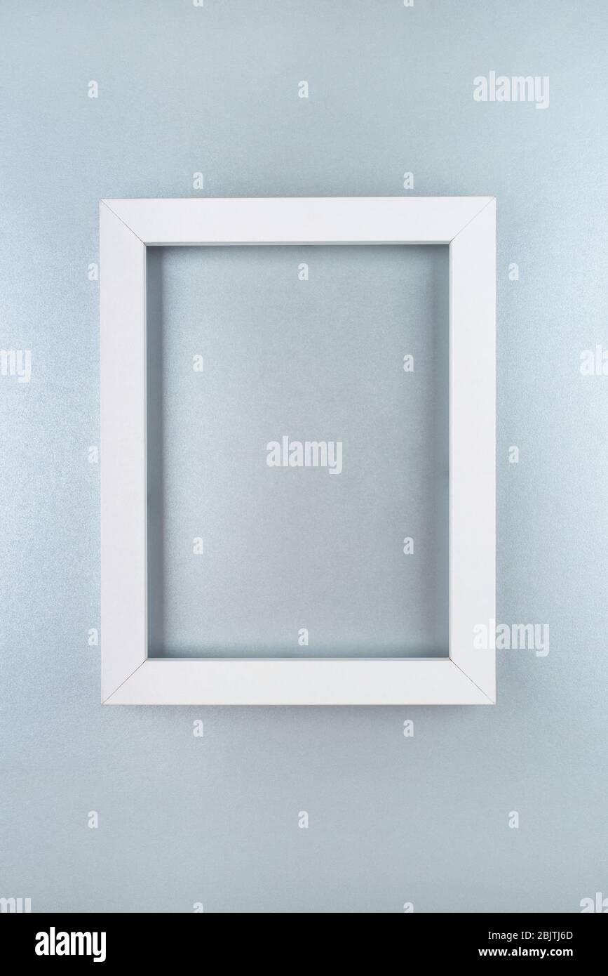 White text frame on a silver background. Stock Photo