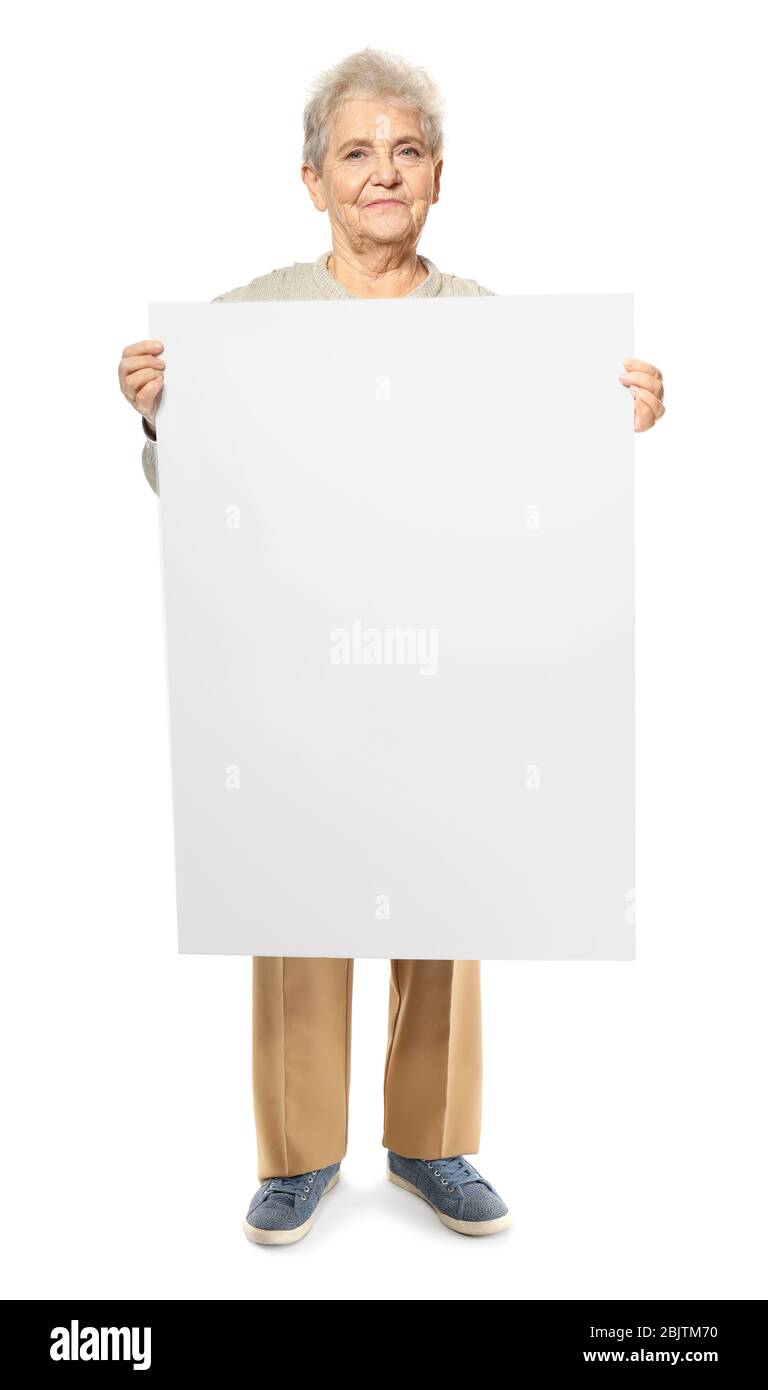 Senior woman with blank advertising board on white background Stock Photo