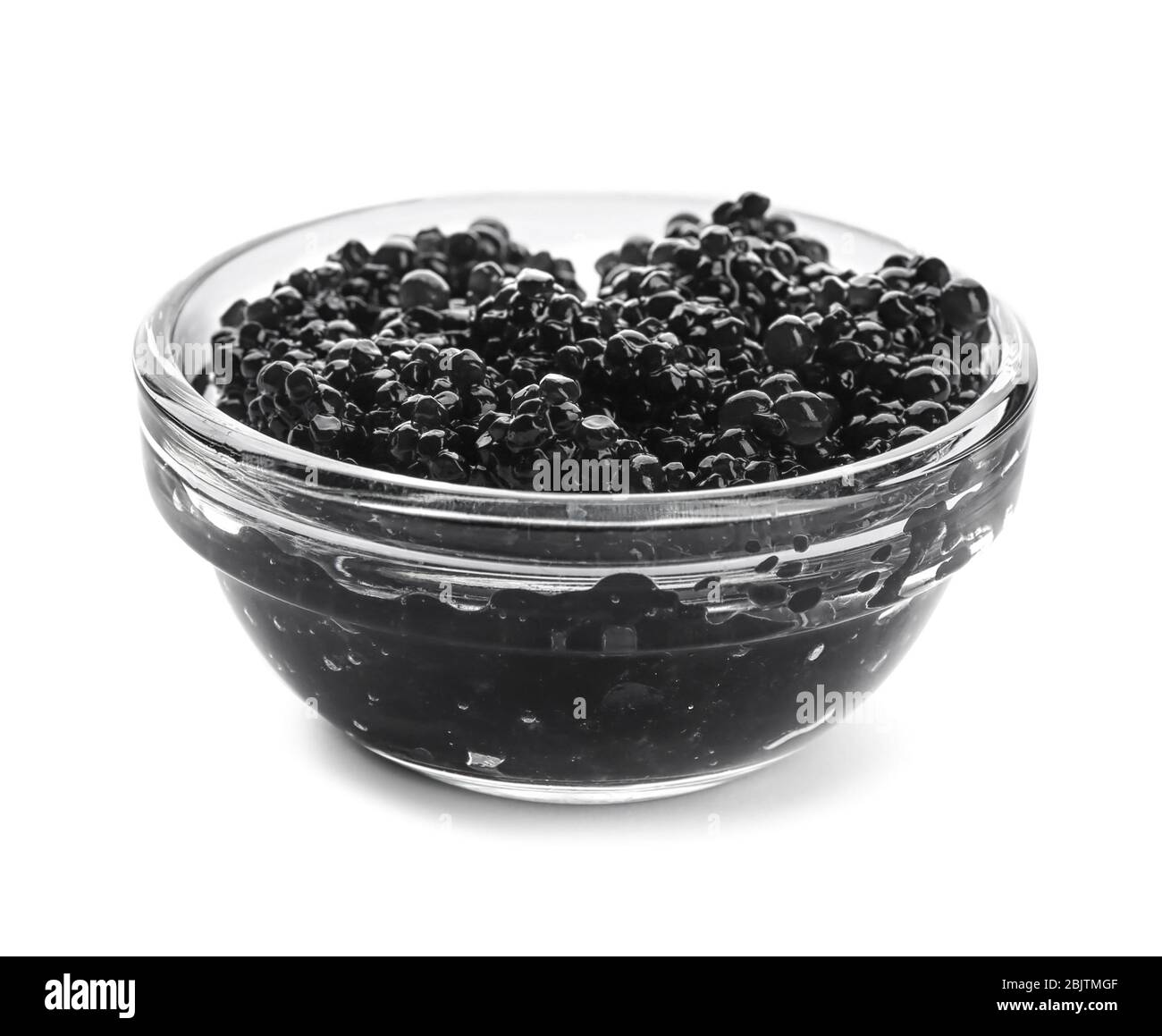 Black caviar in glass bowl on white background Stock Photo - Alamy