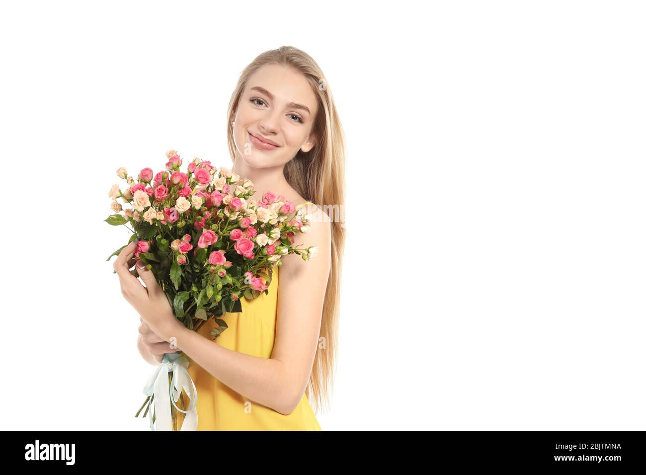 Beautiful young woman with bouquet of roses on white background Stock ...