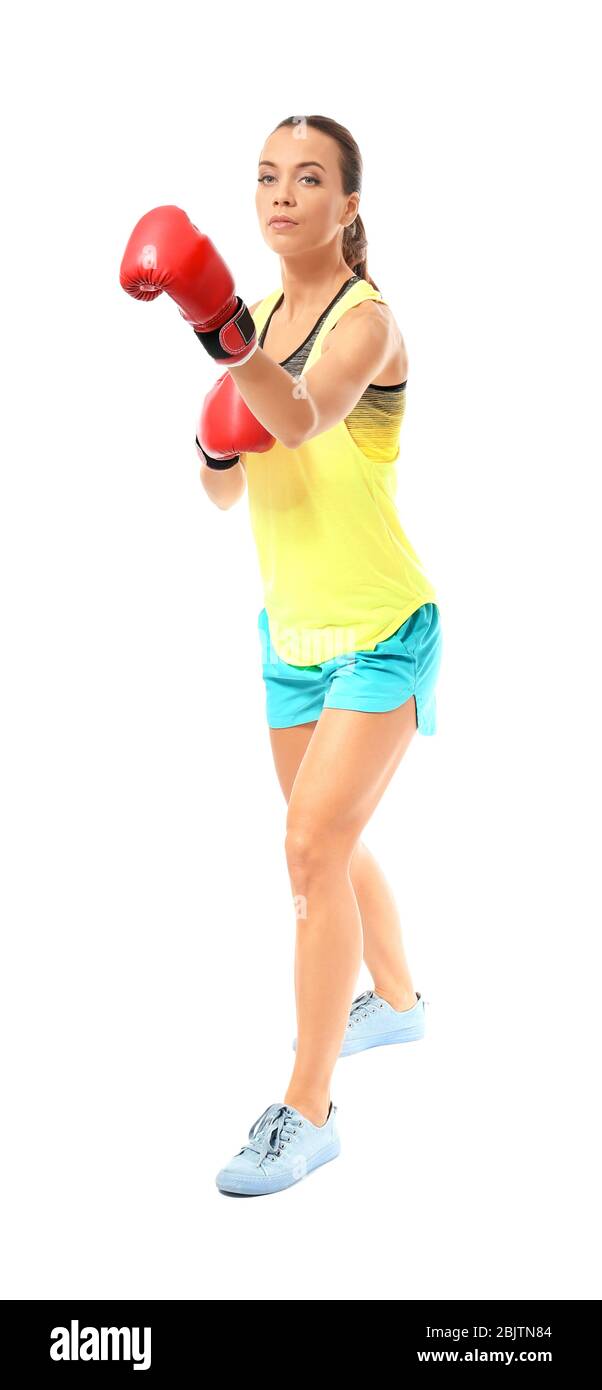 Strong woman in boxing gloves on white background Stock Photo