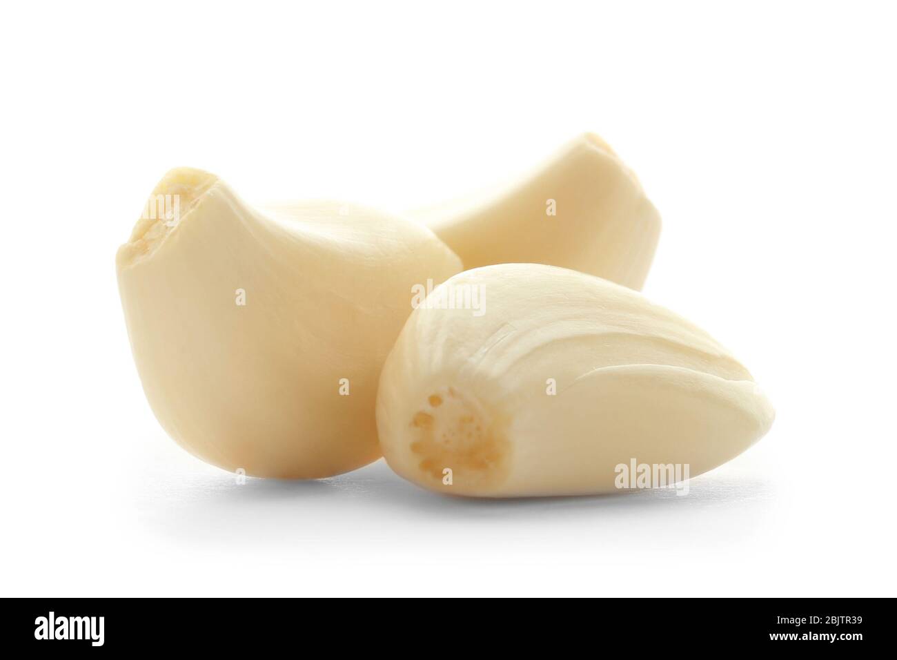 Fresh garlic cloves on white background Stock Photo - Alamy