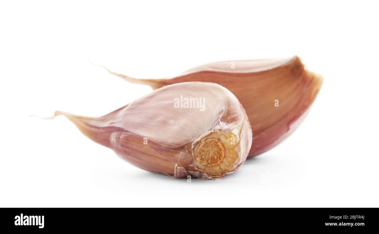 Fresh garlic cloves on white background Stock Photo - Alamy