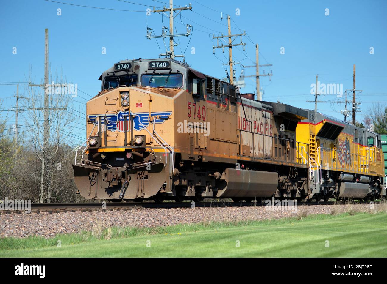 Geneva, Illinois, USA. A pair of lead a mixed freight train