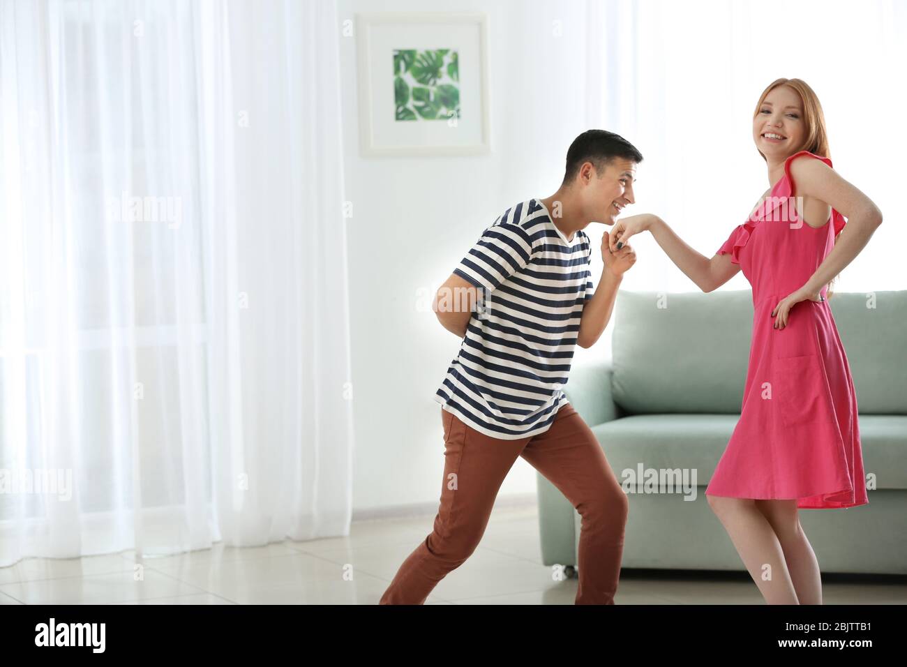 Man kissing hand hi-res stock photography and images - Alamy