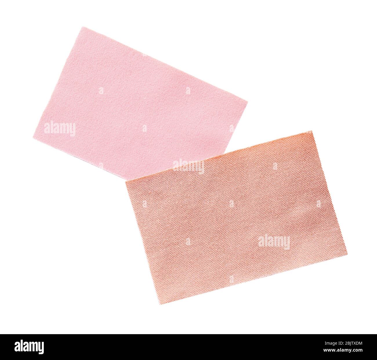 Textile samples on white background. Fabric texture Stock Photo - Alamy