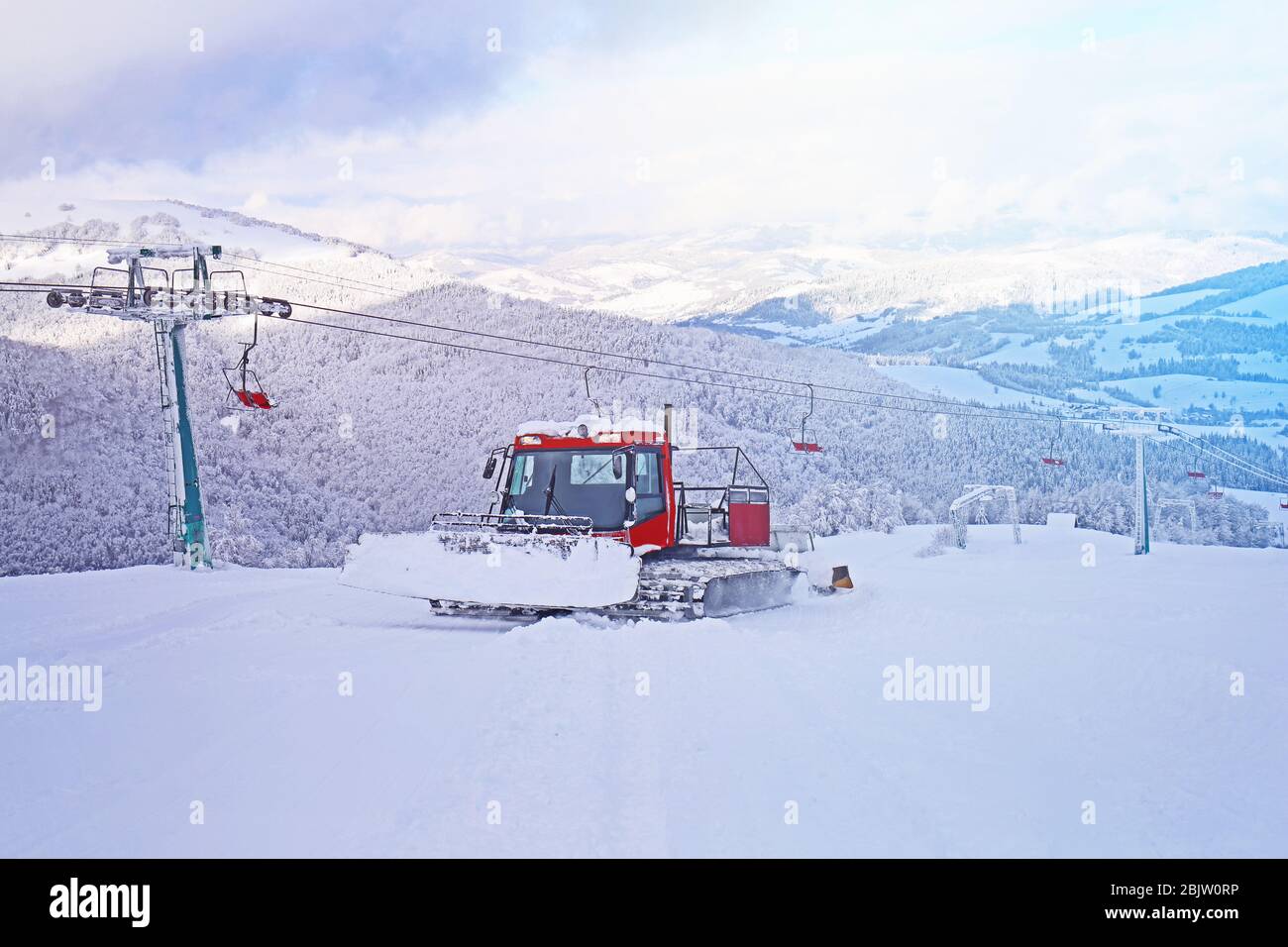 Snowplow machine at ski mountain resort Stock Photo Alamy