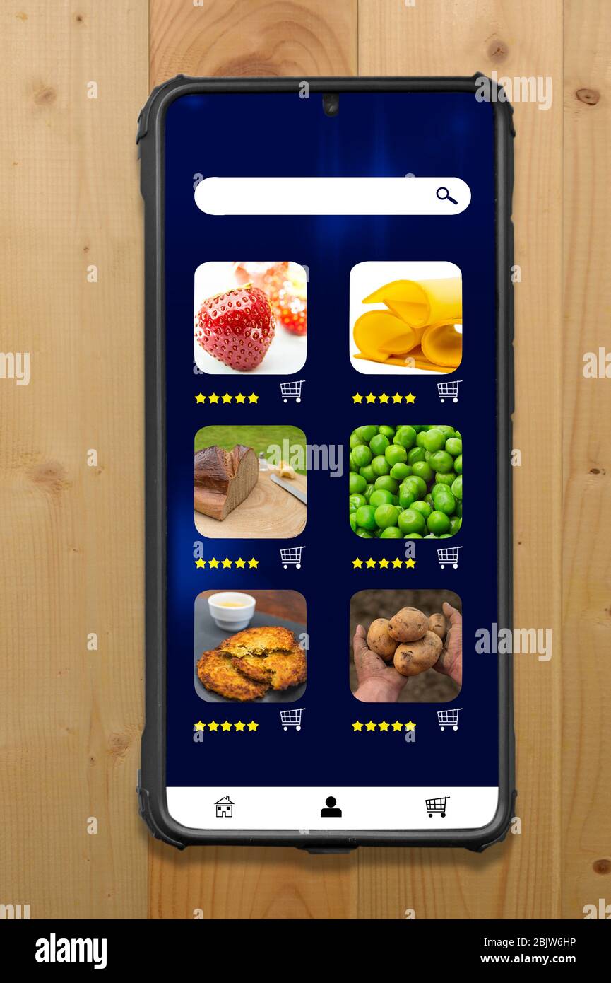 Food is ordered online. An app enables ordering via smartphone. App is fictitious and royalty free. Stock Photo