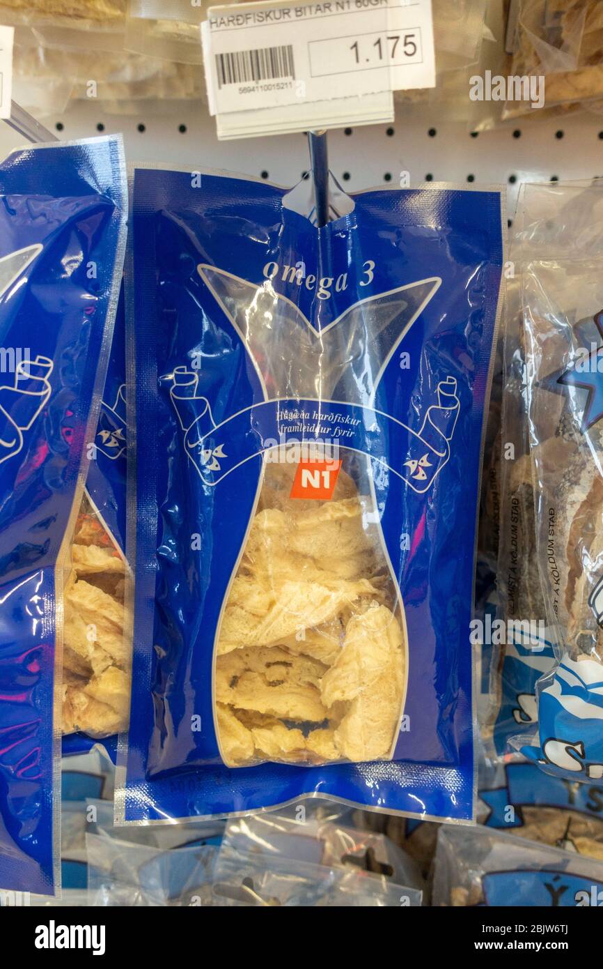 Dried hard fish on a service station/petrol station shop rack, Borgarnes, Iceland. Stock Photo