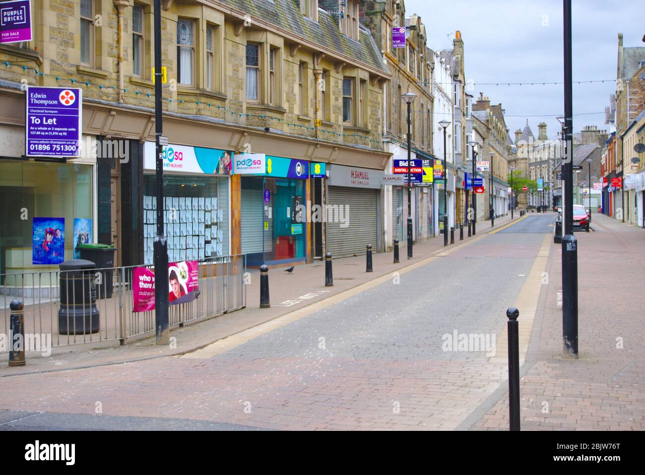 Channel Street in the shopping district of Galashiels, Scottish Borders, almost deserted due to UK Covid-19 coronavirus lockdown policy Stock Photo