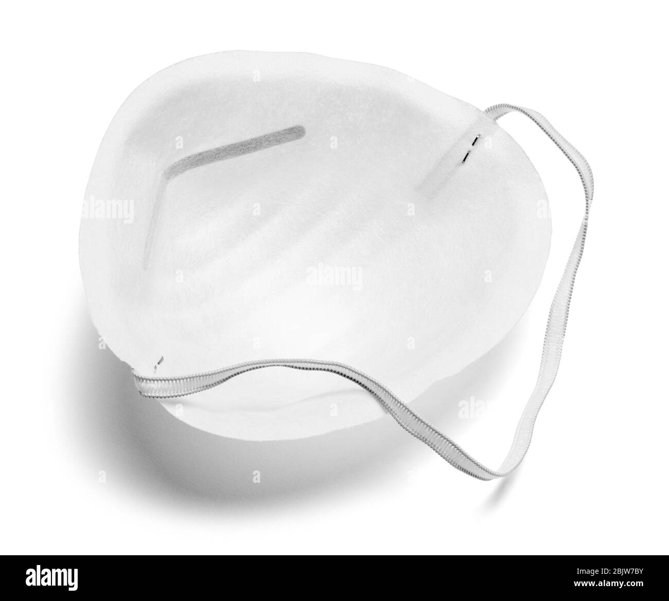 Worn Resting Surgical Medical Mask Cut Out. Stock Photo