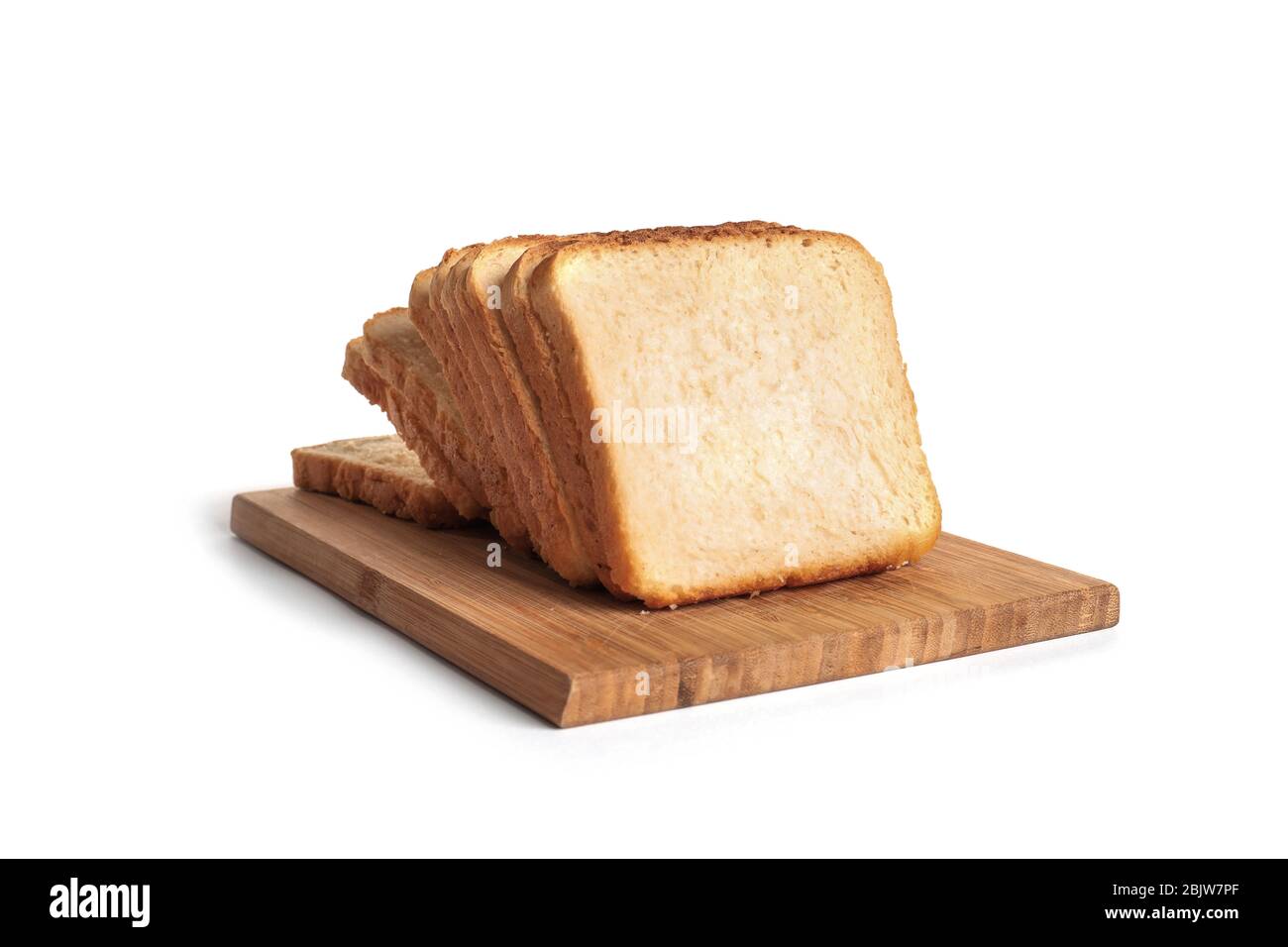 Wooden board with slices of bread for toasting on white background ...