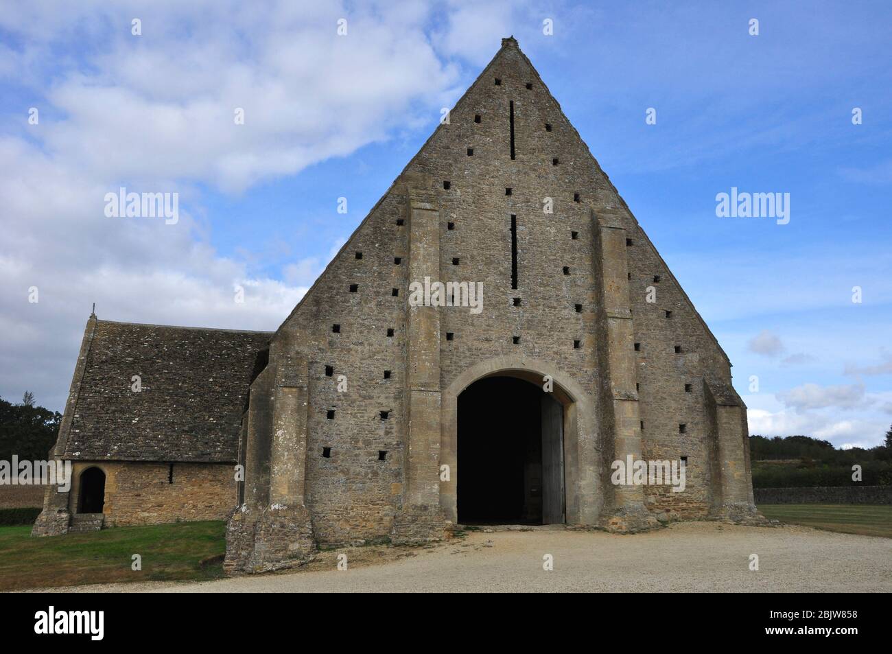 Great Coxwell tithe barn; built about 1292 for the Cistercian Beaulieu Abbey in Hampshire; which had held the manor of Great Coxwell since 1205.Built Stock Photo