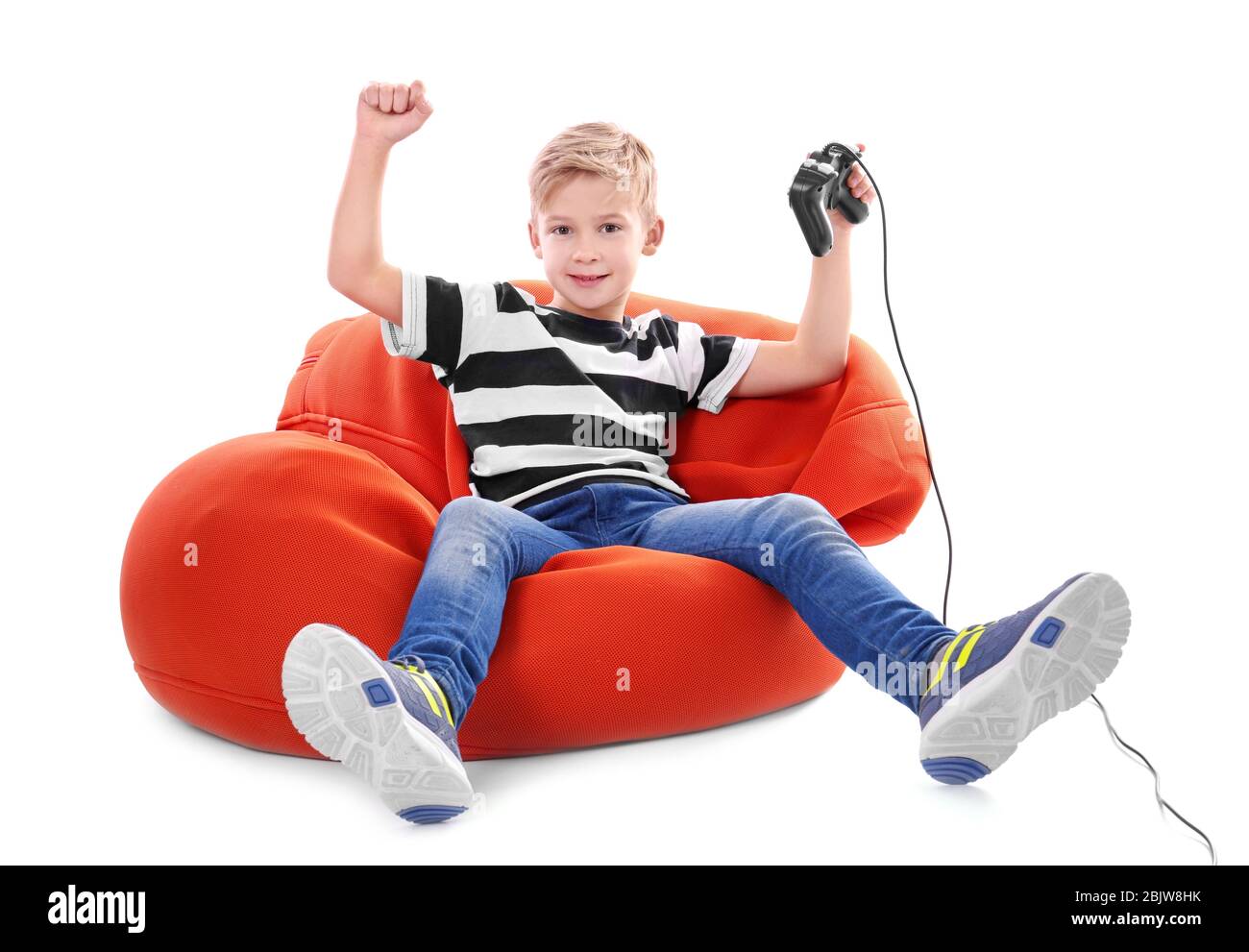 Happy boy with video game controller on white background Stock Photo ...