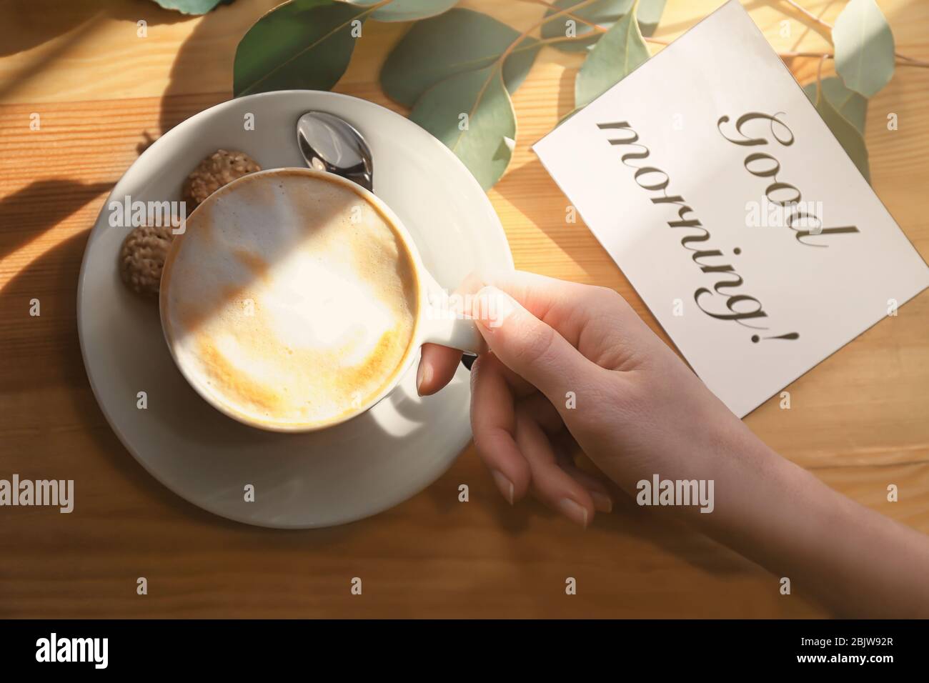 Woman Holding Cup Of Aromatic Coffee At Table Tasty Breakfast And Card With Good Morning Wish Stock Photo Alamy